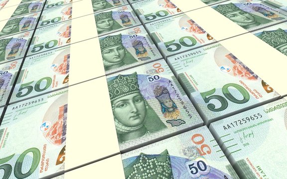 Georgian lari bills stacks background. 3D illustration.