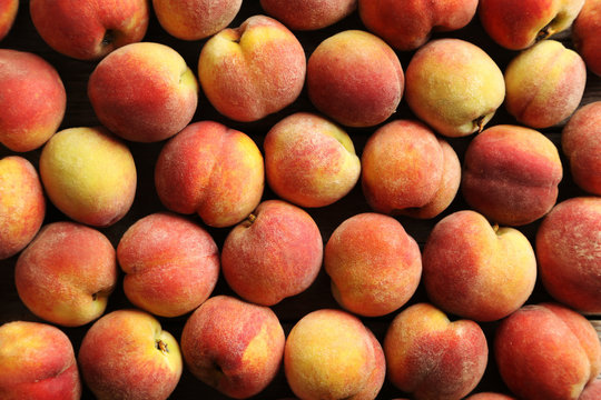 Ripe and sweet peach fruit background