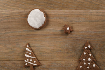 gingerbread chocolate cookies over wood table forms composition