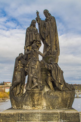 Fototapeta na wymiar Statues of Saints Cyril and Methodius on Charles Bridge in Pragu