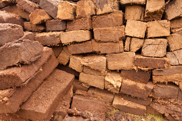 Dry stacked peat turf briquette cuttings pattern