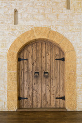 Wooden door in a stone castle