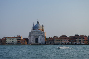 View on La Giudecca island with basilica del Redentore on the sunset in Venice. Italy