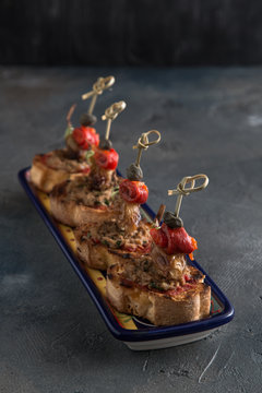 Tuna Tapenade on Lightly Toasted Baguette with pepper, onion and capers