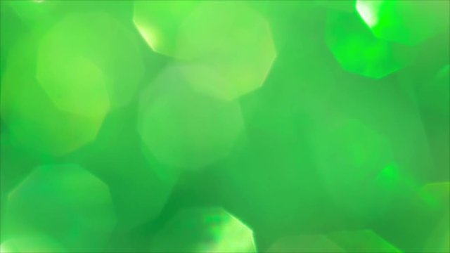 Green bokeh Christmas background. Defocused lights. 