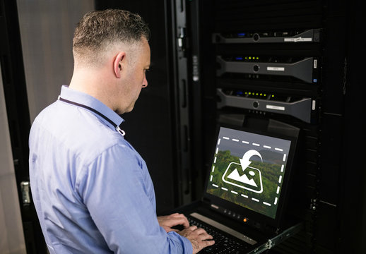 Technician Using Laptop Mockup 2