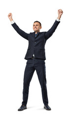 Happy businessman in celebrating pose isolated on the white background.