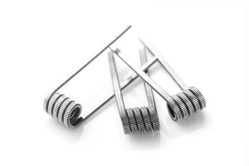 Fused clapton coils for vaping on a white background