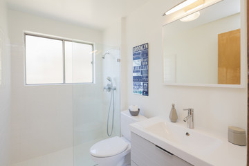 Naklejka na ściany i meble Beige Bathroom with large mirrors, interior and modern bathroom.