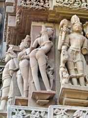Apsara naked dancers in candid poses; sculpture