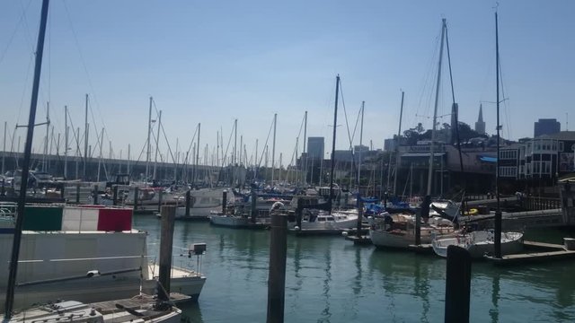 San Francisco, California - July, 2016 - Panning shot of the Boats at the Marina.