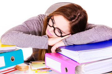 woman tired with stack of folders documents