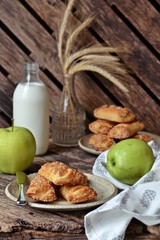 Apple Puffs on the wooden background 