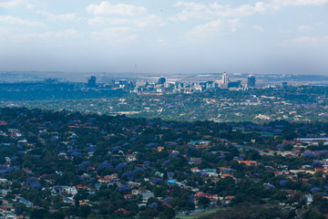 Looking up to the Northcliff Reservoir with Clouds behind the water tower Center screen