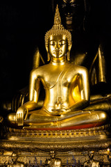 Golden Buddha statue in the church