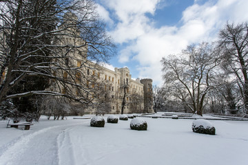 beautiful grand castle covered in snow in winter in Czech Republ