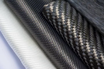 Foto op Plexiglas Carbon fiber composite raw material © prakasitlalao