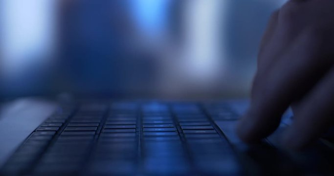 Business person working typing on laptop PC computer keyboard