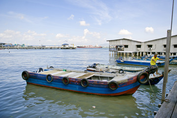 Heritage Chew Clan Jetties & village stilts above the sea water where Chinese clans live in Georgetown, Penang, Malaysia.