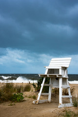 Lifeguards chair on a beach during a storm