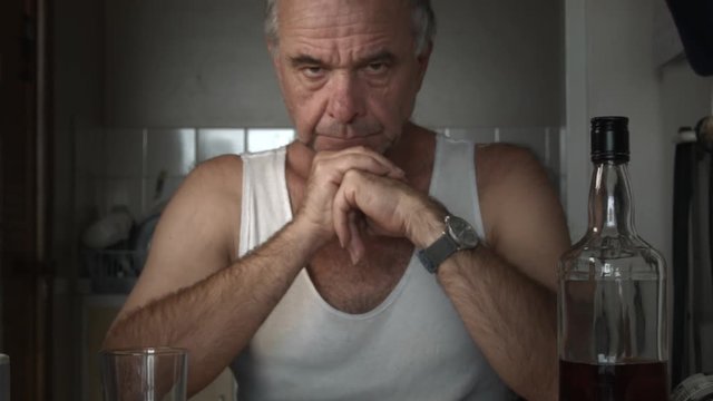 Suicidal Lonely Unhappy Adult male with depression contemplating suicide