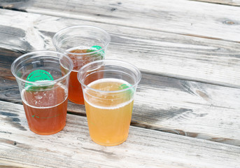 Beer cups on table