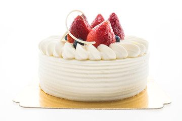 Vanilla cream cake with strawberry on top