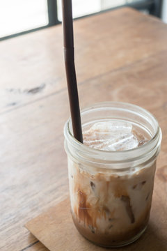 Iced glass of latte coffee