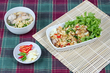 Home made,Fried garlic jasmine rice with minced pork served with side dish as Macaroni chicken soup and spicy filling