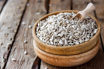 sunflower seeds in a wooden bowl