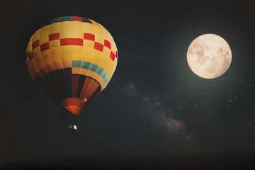 Rolgordijnen Beautiful fantasy of hot air balloon and full moon with milky way star in night skies background. Retro style artwork with vintage color tone © jakkapan