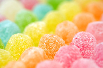 Colorful fruit jelly candy solf focus texture background