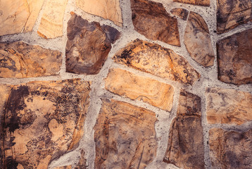 Fragment of a stone wall with mortar