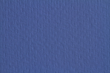 Blue paper texture, dark background