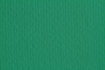 Green paper texture, dark background