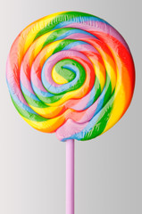 Round lollipop with colorful rainbow swirls