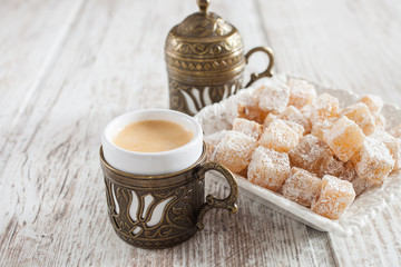 coffee and the Turkish delight  on a table, selective focus