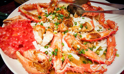 king crab legs meat on white plate