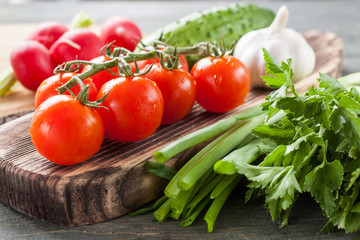 fresh vegetables on a wooden background, selective focus