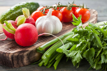 fresh vegetables on a wooden background, selective focus