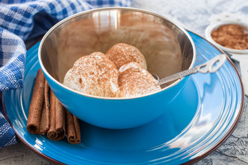 ice cream balls in a plate on a table, selective focus
