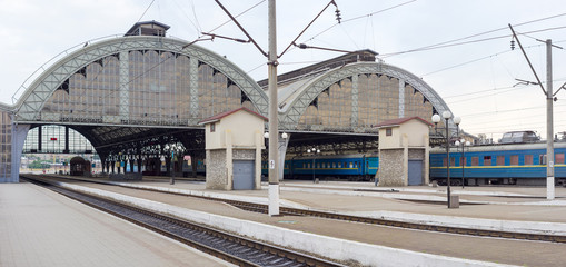 Arched metal and glass train shed of train station