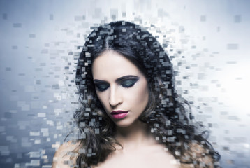 Portrait of a woman in makeup on a desorted background