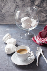 coffee and zephyr on a table, selective focus