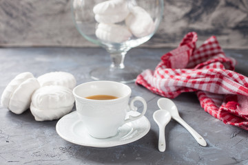 coffee and zephyr on a table, selective focus