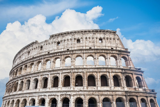 Colosseum in Rome, Italy on blue sky background