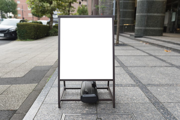 Large blank billboard on a street wall, banners with room to add your own text