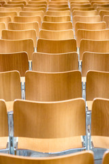 Chairs in row in conference room
