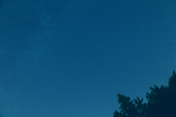Fototapeta na wymiar Silhouettes of the countryside with starry skies