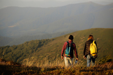 couple walking on mountain